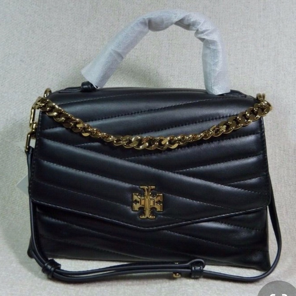 Black shoulder bag used it one time.
